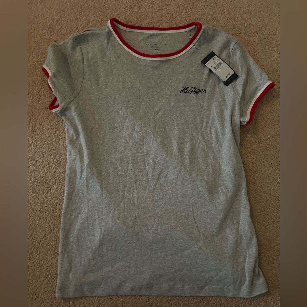 Tommy Hilfiger grey t-shirt with a red and white neckline.